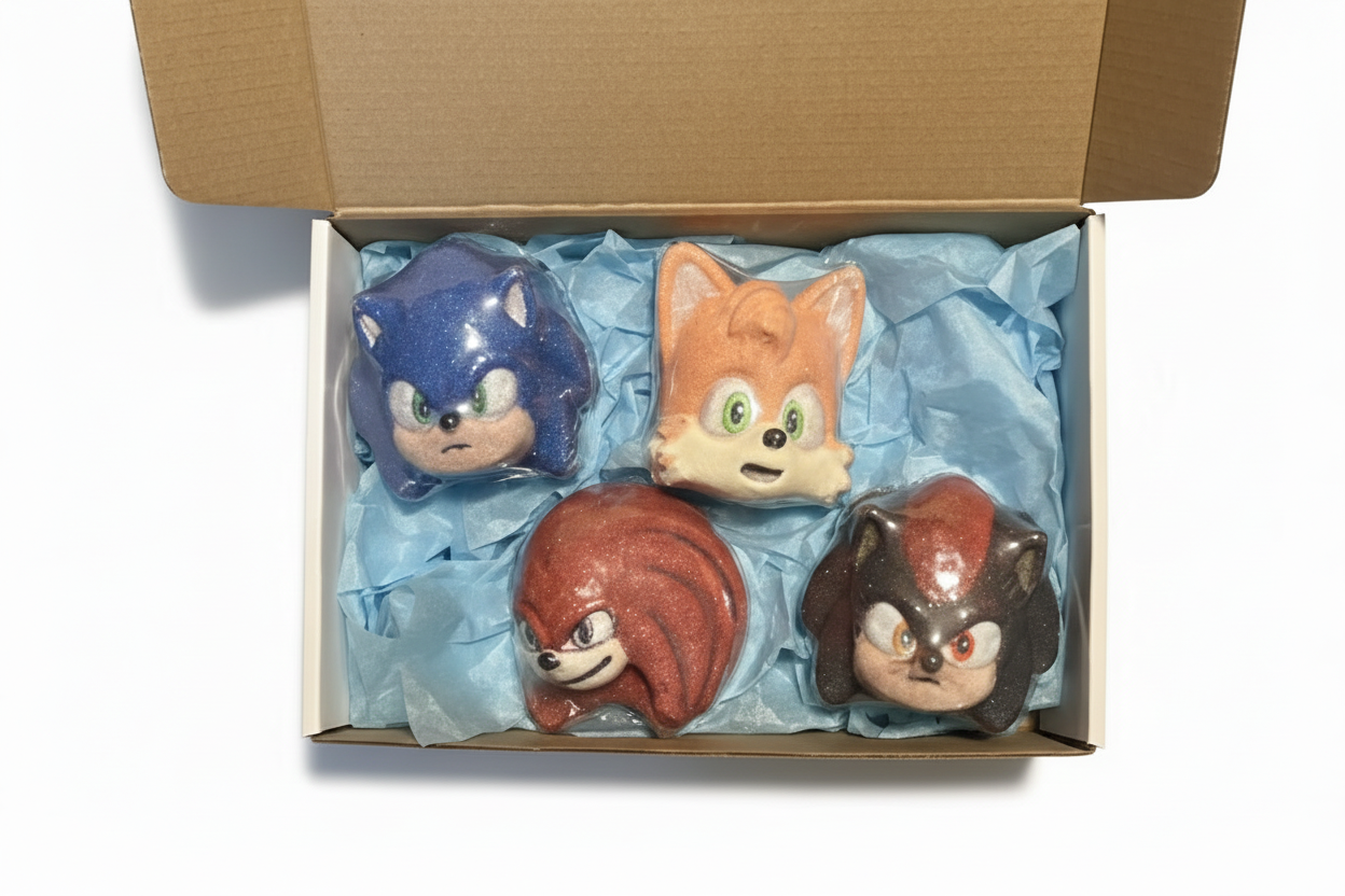 Four sonic  character figurines in a box with blue tissue paper