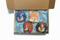 Four sonic  character figurines in a box with blue tissue paper