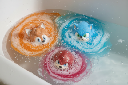 Three colorful sonic figurines in a box with shredded paper