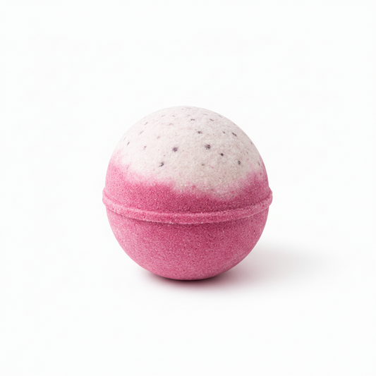 Pink and white bath bomb on a white background